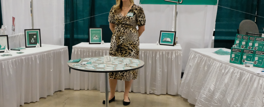 Paulette Standing at AWP Booth